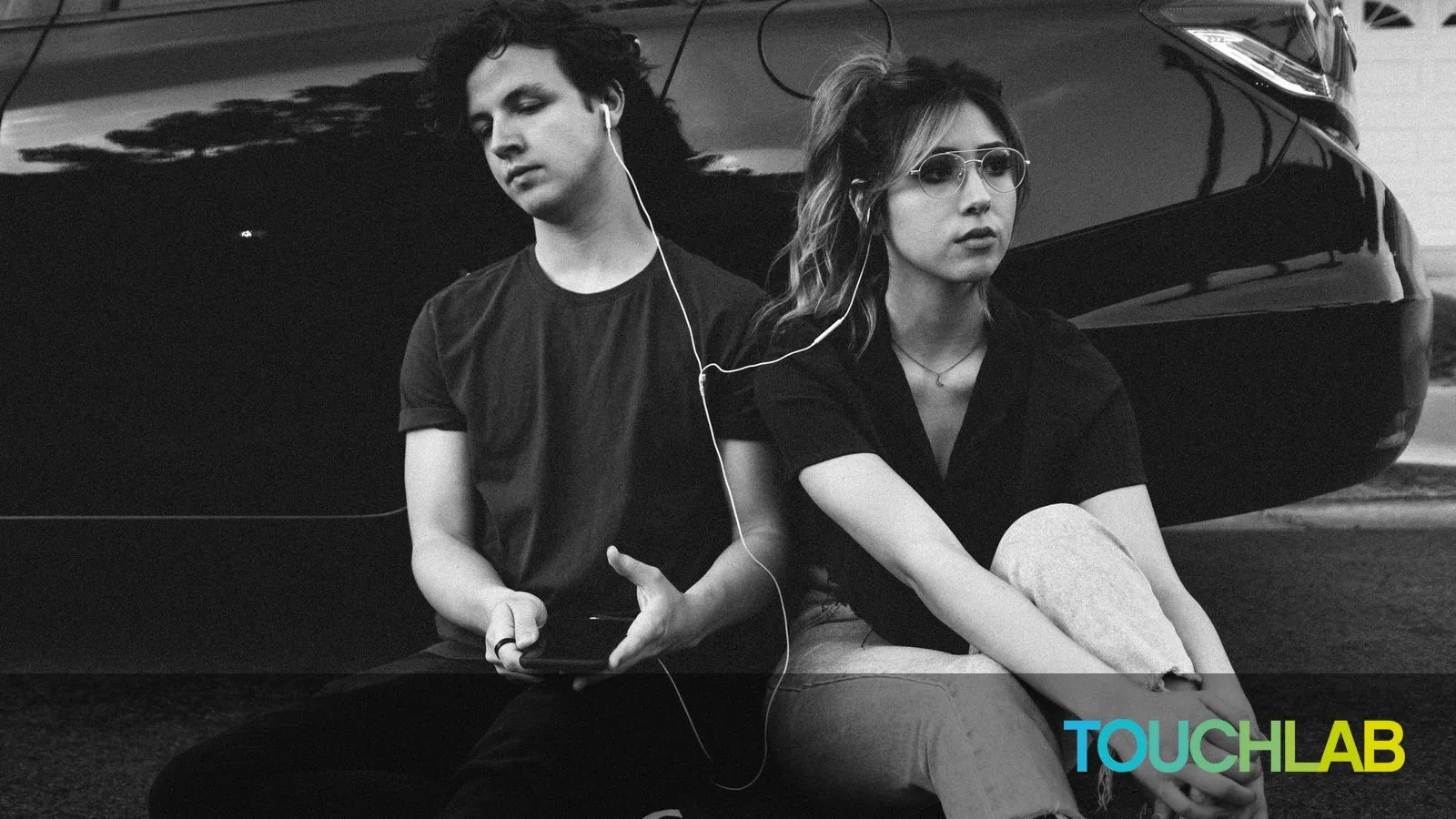 Wesley Tingey on Unsplash - https://unsplash.com/photos/grayscale-photo-of-man-and-woman-leaning-on-vehicle-icnqtN3SoqA
